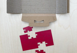 Kleinpuzzle mit Papierverpackung